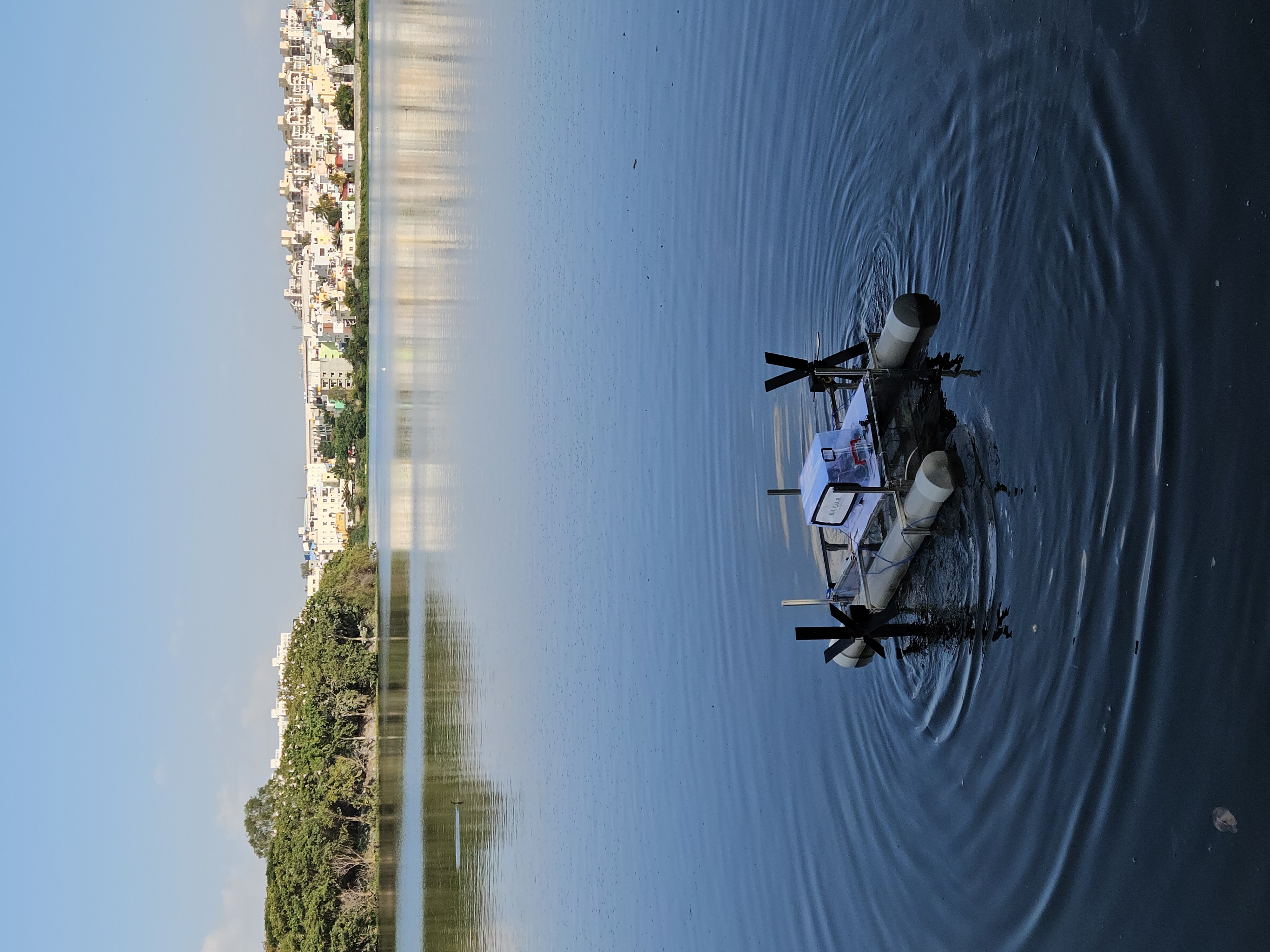 SCRUB prototype creating ripples during a real trial at Madiwala Lake